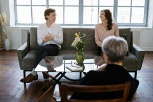 A married couple engages in a therapy session with a psychologist in Bensalem, PA.